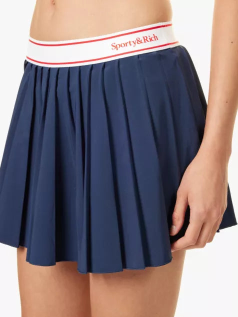 Serif Logo Pleated Skirt Navy thebeachproject
